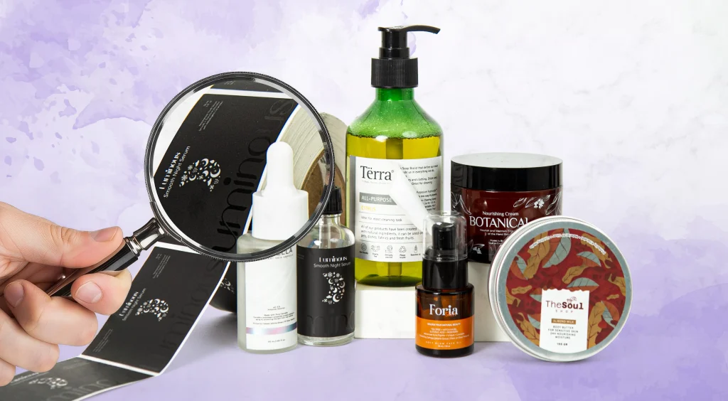 Assorted skincare products and a handheld mirror arranged on a lavender surface.